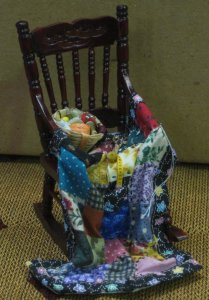 rocking chair with quilt